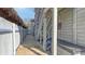Exterior walkway showcasing beach access, stairs, and nearby amenities at 126/128 Avenida Veneccia, Sarasota, FL 34242