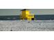 Yellow lifeguard station on a pristine beach at 126/128 Avenida Veneccia, Sarasota, FL 34242