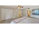 Comfortable main bedroom featuring a large closet and access to the ensuite bathroom at 126/128 Avenida Veneccia, Sarasota, FL 34242