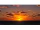 Beautiful sunset view over ocean with colorful clouds at 126/128 Avenida Veneccia, Sarasota, FL 34242