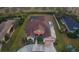 Aerial view showcasing the house, pool, and surrounding landscape at 13207 49Th E Ln, Parrish, FL 34219