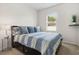 Bedroom with a queen bed and plenty of storage at 13207 49Th E Ln, Parrish, FL 34219