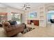 Spacious living room with built-in entertainment center at 13207 49Th E Ln, Parrish, FL 34219