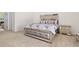 Main bedroom with large bed and mirrored furniture at 13207 49Th E Ln, Parrish, FL 34219
