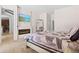 Main bedroom with fireplace and large TV at 13207 49Th E Ln, Parrish, FL 34219