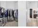 Large walk-in closet with ample shelving and hanging space at 13207 49Th E Ln, Parrish, FL 34219