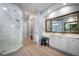 Large Primary bathroom with a walk-in shower and soaking tub at 14721 Bowfin Ter, Lakewood Ranch, FL 34202