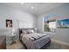Charming bedroom with a full-size bed and a window at 14721 Bowfin Ter, Lakewood Ranch, FL 34202