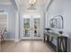 Bright and airy entryway with double doors and light flooring at 14721 Bowfin Ter, Lakewood Ranch, FL 34202