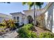 Welcoming front entry with double doors and professional landscaping at 14721 Bowfin Ter, Lakewood Ranch, FL 34202