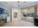 Gathering room with pool view and access to the outdoor patio at 14721 Bowfin Ter, Lakewood Ranch, FL 34202