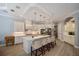 Island kitchen with white cabinets and stainless steel appliances at 14721 Bowfin Ter, Lakewood Ranch, FL 34202