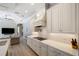 White kitchen with gas cooktop and ample counter space at 14721 Bowfin Ter, Lakewood Ranch, FL 34202