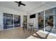 Covered patio with seating area and views of the pool and house at 14721 Bowfin Ter, Lakewood Ranch, FL 34202