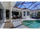 Inviting pool area with covered lanai and seating at 14721 Bowfin Ter, Lakewood Ranch, FL 34202
