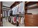 Large walk-in closet with ample shelving and hanging space at 14721 Bowfin Ter, Lakewood Ranch, FL 34202