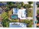 Aerial view showing home's pool, large lot, and location at 1509 Flower Dr, Sarasota, FL 34239
