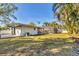 Spacious backyard with pool, shed and lush landscaping at 1509 Flower Dr, Sarasota, FL 34239