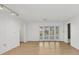 Living room with pool view and access to other rooms at 1509 Flower Dr, Sarasota, FL 34239