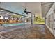 Spacious pool area with screened enclosure and flagstone patio at 1509 Flower Dr, Sarasota, FL 34239