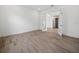 Spacious bedroom with modern tile flooring and elegant double french doors at 15610 San Lazzaro Ave, Bradenton, FL 34211
