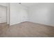 Neutral bedroom with tile floors, closet, and clean white walls at 15610 San Lazzaro Ave, Bradenton, FL 34211