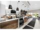 Cozy cafe featuring modern lighting, a well-equipped counter, and comfortable seating area at 15610 San Lazzaro Ave, Bradenton, FL 34211