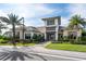 Exterior shot of a clubhouse featuring lush landscaping, a well-manicured lawn, and a welcoming entrance at 15610 San Lazzaro Ave, Bradenton, FL 34211