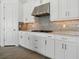 Modern kitchen boasts stainless steel appliances and shaker style cabinets at 15610 San Lazzaro Ave, Bradenton, FL 34211