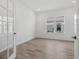 Home office space features a large window and French doors at 15610 San Lazzaro Ave, Bradenton, FL 34211