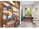 Bright retail area showcasing shelves stocked with various skincare and beauty products by a sunlit window at 15610 San Lazzaro Ave, Bradenton, FL 34211