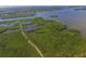 Aerial view of lush mangroves and waterways at 1719 Starling Dr # 1719, Sarasota, FL 34231