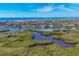 Aerial view of waterfront property with lush mangrove landscape at 1719 Starling Dr # 1719, Sarasota, FL 34231