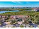 Aerial view of community with water access and lush landscaping at 1719 Starling Dr # 1719, Sarasota, FL 34231