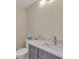 Clean bathroom with single sink vanity and toilet at 1719 Starling Dr # 1719, Sarasota, FL 34231