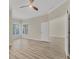 Spacious bedroom with wood-look floors and lots of natural light at 1719 Starling Dr # 1719, Sarasota, FL 34231