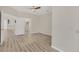 Spacious bedroom with wood-look floors and access to closets at 1719 Starling Dr # 1719, Sarasota, FL 34231