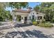Community guard house entrance with signage and gated access at 1719 Starling Dr # 1719, Sarasota, FL 34231