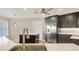 Modern kitchen with stainless steel appliances and an island at 1719 Starling Dr # 1719, Sarasota, FL 34231