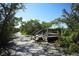 Scenic nature trail with a wooden platform offering tranquil views at 1719 Starling Dr # 1719, Sarasota, FL 34231