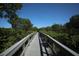 Elevated boardwalk path through a mangrove forest at 1719 Starling Dr # 1719, Sarasota, FL 34231