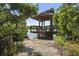 Relaxing waterfront pavilion with wooden seating at 1719 Starling Dr # 1719, Sarasota, FL 34231