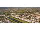 Wider aerial showcasing the home and waterway at 1736 Burgos Dr, Sarasota, FL 34238