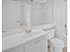 Clean bathroom with white vanity, toilet and bathtub at 1736 Burgos Dr, Sarasota, FL 34238