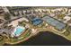 Aerial view of community amenities including pool and tennis courts at 1736 Burgos Dr, Sarasota, FL 34238