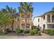 Beautiful two-story townhome with lush landscaping at 1736 Burgos Dr, Sarasota, FL 34238