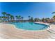 Inviting community pool with ample deck space for lounging at 1736 Burgos Dr, Sarasota, FL 34238