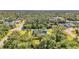 Aerial view of a house nestled in a wooded neighborhood at 17402 Billiar Ave, Port Charlotte, FL 33948