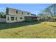 Large backyard with two story house at 17402 Billiar Ave, Port Charlotte, FL 33948
