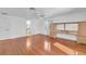 Bright bedroom with hardwood floors and an ensuite bathroom at 17402 Billiar Ave, Port Charlotte, FL 33948